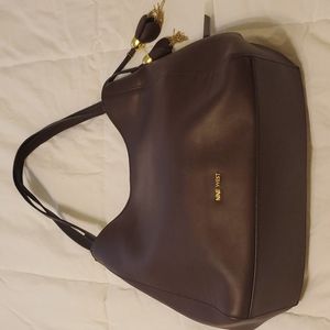Nine west handbag. Plum color. NWT. Medium size.